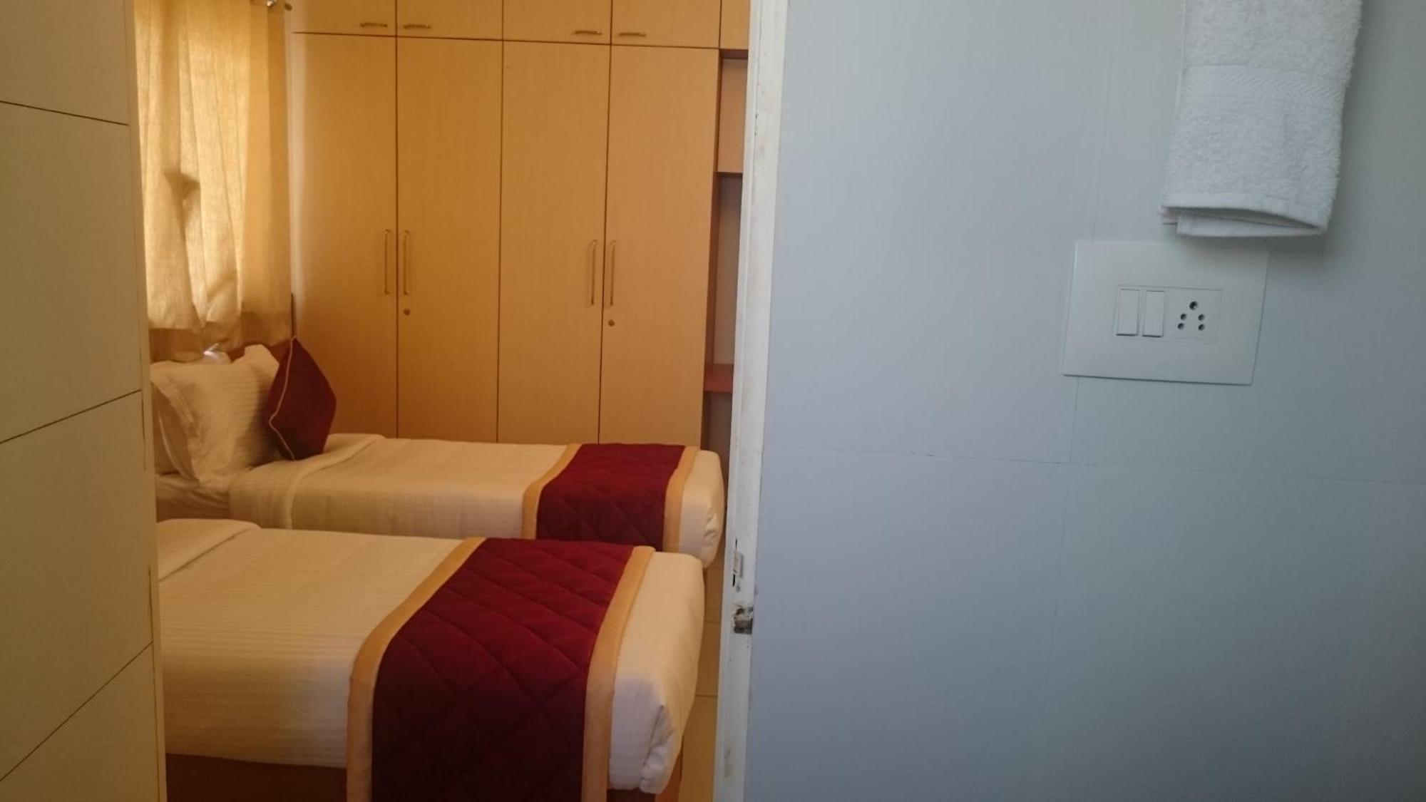 ホテル Sap ゴールデン グランデ Kammasandra 部屋 写真